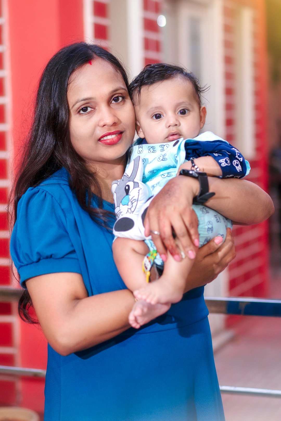 Happy mother with baby, trusted baby care at home in Delhi NCR